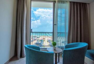 Фото номера Двухместный номер с 1 кроватью и прямым видом на море Отель Hotel Magnific г. Кранево 4